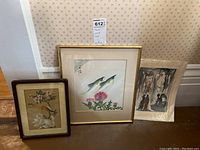 Overview of all three pieces leaning against wall; shows relative sizes and framing