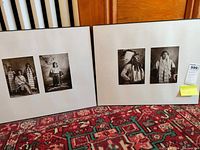 Two framed sets of Native American photos photographed on carpet with wood background
