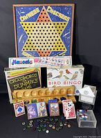 Full display of all items including games, playing cards, Chinese Checkers and Mancala boards with accessories.