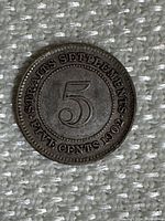 Reverse side showing the denomination '5' and inscription 'STRAITS SETTLEMENTS FIVE CENTS 1902'.