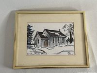 Framed watercolour painting depicting Boxgrove United Church in monochrome tones.