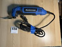Mastercraft multicrafter tool laid horizontally showing the Mastercraft logo and electric cord