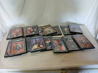 Seventeen Yu Yu Hakusho anime CDs laid out on a flat surface, showing colorful cover artwork in original plastic cases.