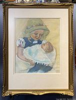 Full view of the pastel painting showing a girl in a green hat and blue dress holding a baby, framed in an ornate gold frame.
