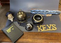 Full lot showing all six items on a table against a neutral background