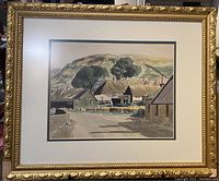 Full view of framed painting depicting a rural landscape with buildings and hills.