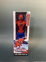 Front view of Spider-Man action figure in original packaging showing figure, Marvel branding, and Titan Hero Series label.