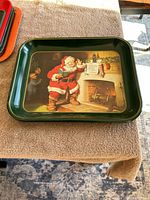 Top side of one Coca-Cola serving tray showing vintage Santa Claus and Christmas design