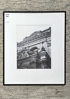Full view of the framed black and white photograph showing detailed classical architecture of the Toronto building, with signature and framing visible