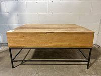 Front view of coffee table closed