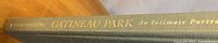 Close-up of the book's spine showing title and author name in gold text.