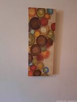Canvas print with colorful overlapping circles on vertical canvas