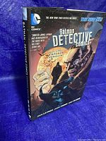 Front angled photo of the hardcover graphic novel showing cover art and spine.