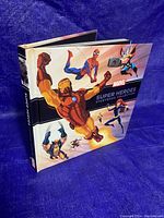 Front and side view of the Marvel Super Heroes Storybook Collection hardcover book showing the colorful superhero cover art.