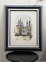 Full view of the framed print showing St. Paul's Cathedral and surrounding streetscape with pedestrians and vehicles.