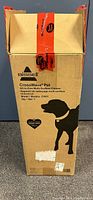 Original cardboard box with Bissell branding and product information visible, including dog silhouette and model number 2369Y.