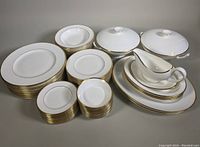 Overview of all dishes and serving pieces arranged on tabletop