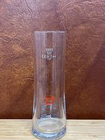 Glass jar with 0.3L measurement markings, showing brand and glass condition