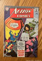 Front cover of Action Comics #348 showing Superman in a boxing ring and inset spy scenes.