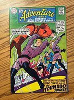 Front cover of Adventure Comics #373 featuring Superboy and the Legion of Super-Heroes with the Tornado Twins story.