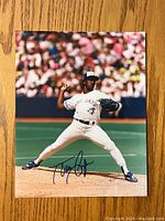 Front side of the 8x10 photo showing Juan Guzman pitching, signed in blue ink.