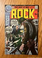 Front cover photo showing the DC Our Army At War Sgt Rock #228 comic book with colorful wartime illustration and dialogue bubbles.