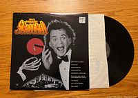 Front cover showing Bill Murray and the movie title, with vinyl partially visible out of the white protective sleeve.