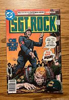Front cover of Sgt Rock #308 comic book, depicting a WWII battle scene with Nazi soldier and Sgt Rock on a beach, including price and DC Comics logo.