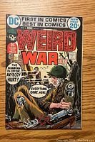Front cover of Weird War Tales Issue #6 comic book showing detailed artwork of soldiers in combat with prominent red title text and DC Comics branding.