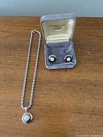 Rope chain necklace and matching pearl stud earrings in grey velvet box