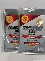 Two sealed packs of Comic Pro Line Bags, Silver Size measuring 7 1/4" x 10 1/2", each pack contains 100 acid free comic book sleeves with 2" flap.