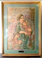 Full view of the framed Mona lithograph by Edna Hibel showing a woman and two children in a pastel color scheme with gold accents.