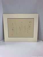 Framed and matted Japanese calligraphy artwork shown from front center.