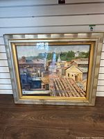 Full front view showing roofline composition in gilt wood frame