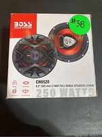 Front view of BOSS CH6520 speaker box showing image of speakers and peak power rating of 250W.