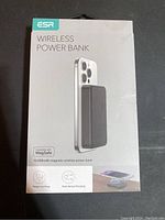 Front of the power bank packaging showing ESR brand, product image of black magnetic power bank attached to a smartphone, and details about 10,000mAh capacity and compatibility with MagSafe.
