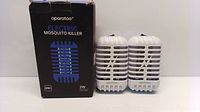 Photo of the packaging box labeled Aparatoo Electric Mosquito Killer and the two white mosquito killer units standing beside it.