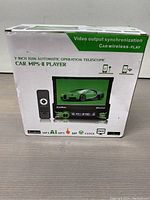 Front view of the Car MP5-II Player box showing image of the player with 7-inch touchscreen, remote control and a car image on the screen.