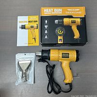 Full kit including Seekone heat tool, nozzle attachment still sealed in plastic, user manual, and original box.