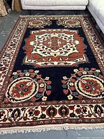 Full view of carpet showing overall design and condition