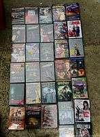 Full overview of DVDs showing front cases with titles visible including various movies and Harry Potter series