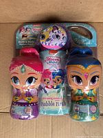 Photo of three Shimmer and Shine bath and body product bottles in packaging