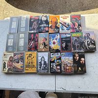 Overview of all VHS movies and tapes showing 20 VHS movies and 4 VHS tapes in plastic cases.