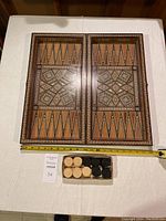 Open board interior view with checkers placed