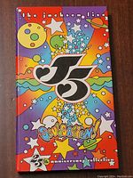 Front view of the colorful CD box set with psychedelic art and Jackson 5 logo.