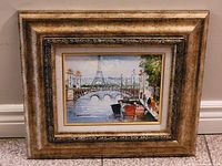 Full frontal view of the framed painting showing detailed artwork and the frame.