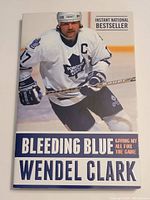 Front cover of the hardcover book showing title, author, and image of Wendel Clark in a Toronto Maple Leafs uniform.
