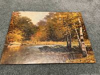 Full view of the Robert Wood print showing a waterside scene with birch trees and autumn colors.