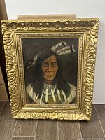 Front view of oil painting showing the subject and ornate gilt frame