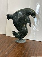 Front-right view of the entire soapstone walrus carving on its base